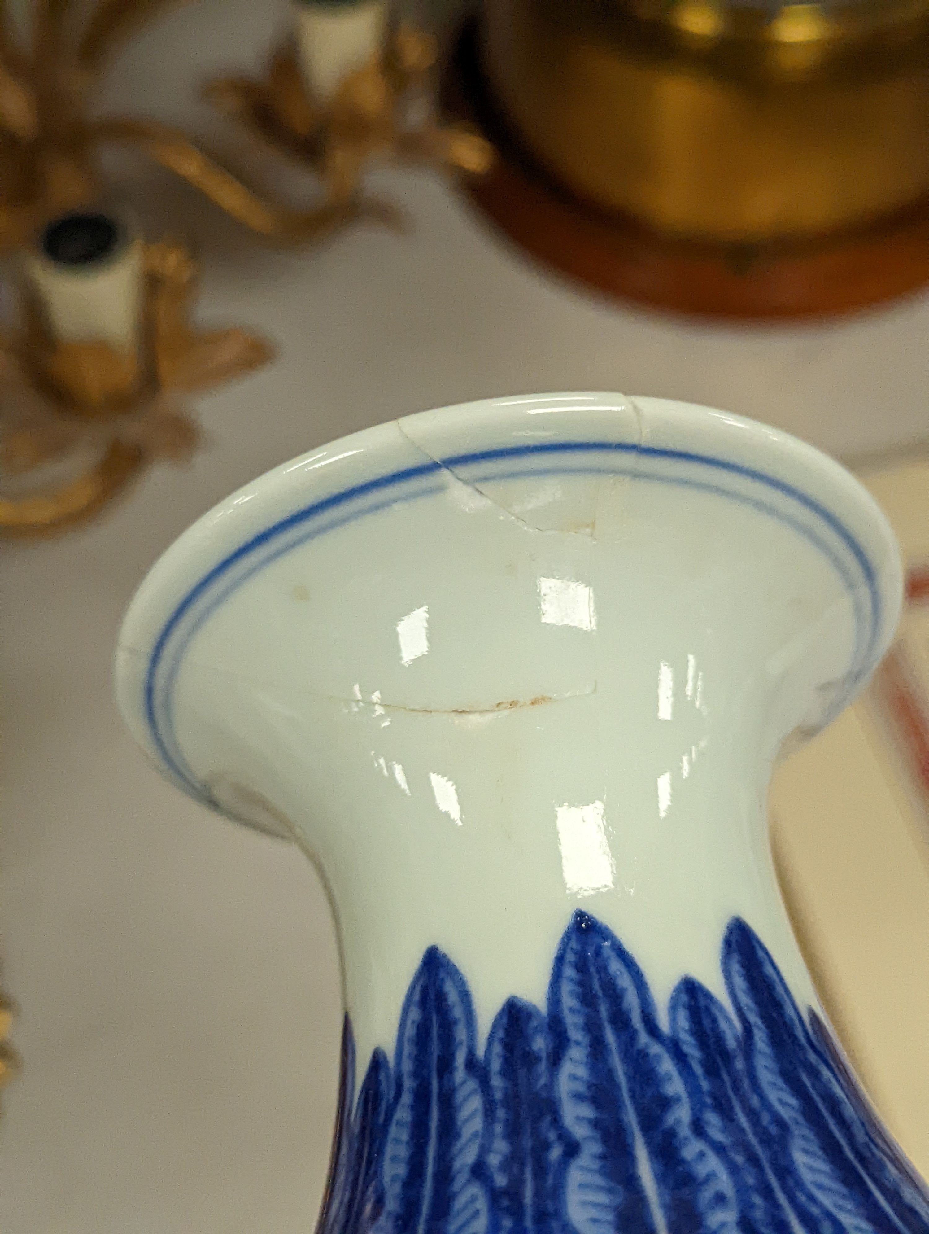 A Chinese blue and white Ming style 'lotus' vase, Yuhuchunping, Qianlong seal mark but 19th century - 28cm high